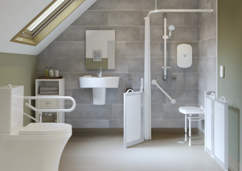 Accessible shower with a fold-down seat, grab bars, and an easy-reach showerhead.